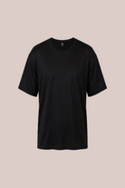 Black t-shirt on a beige background